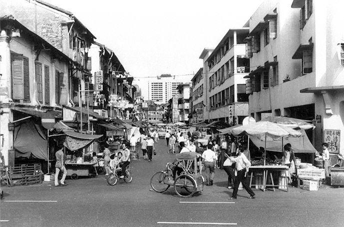 Streets of Sago Lane in 1900s featuring Ping Min Medical Hall